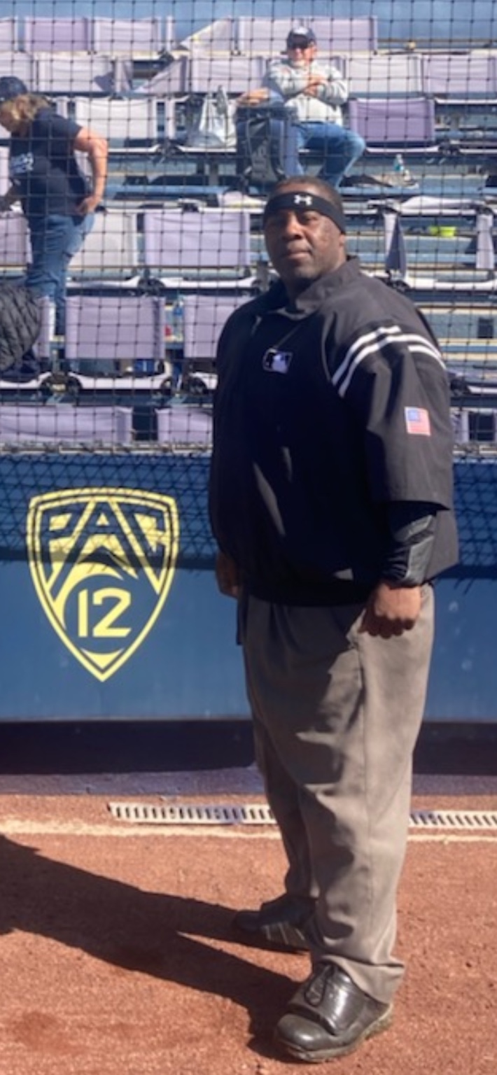 Darryl Allen in umpire uniform at a baseball stadium