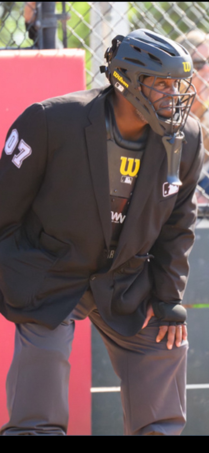 Darryl Allen in plate umpire equipment during a baseball game